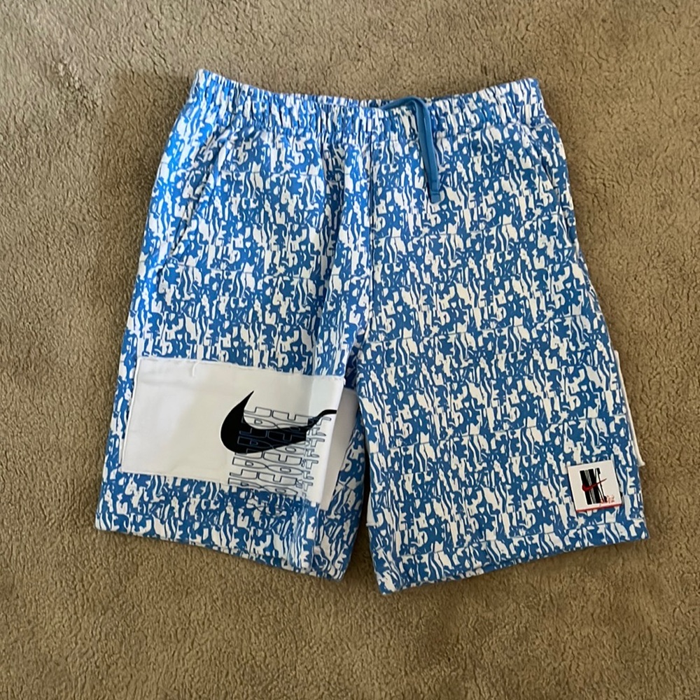 Nike sweat shorts. Has pockets. Super comfy.